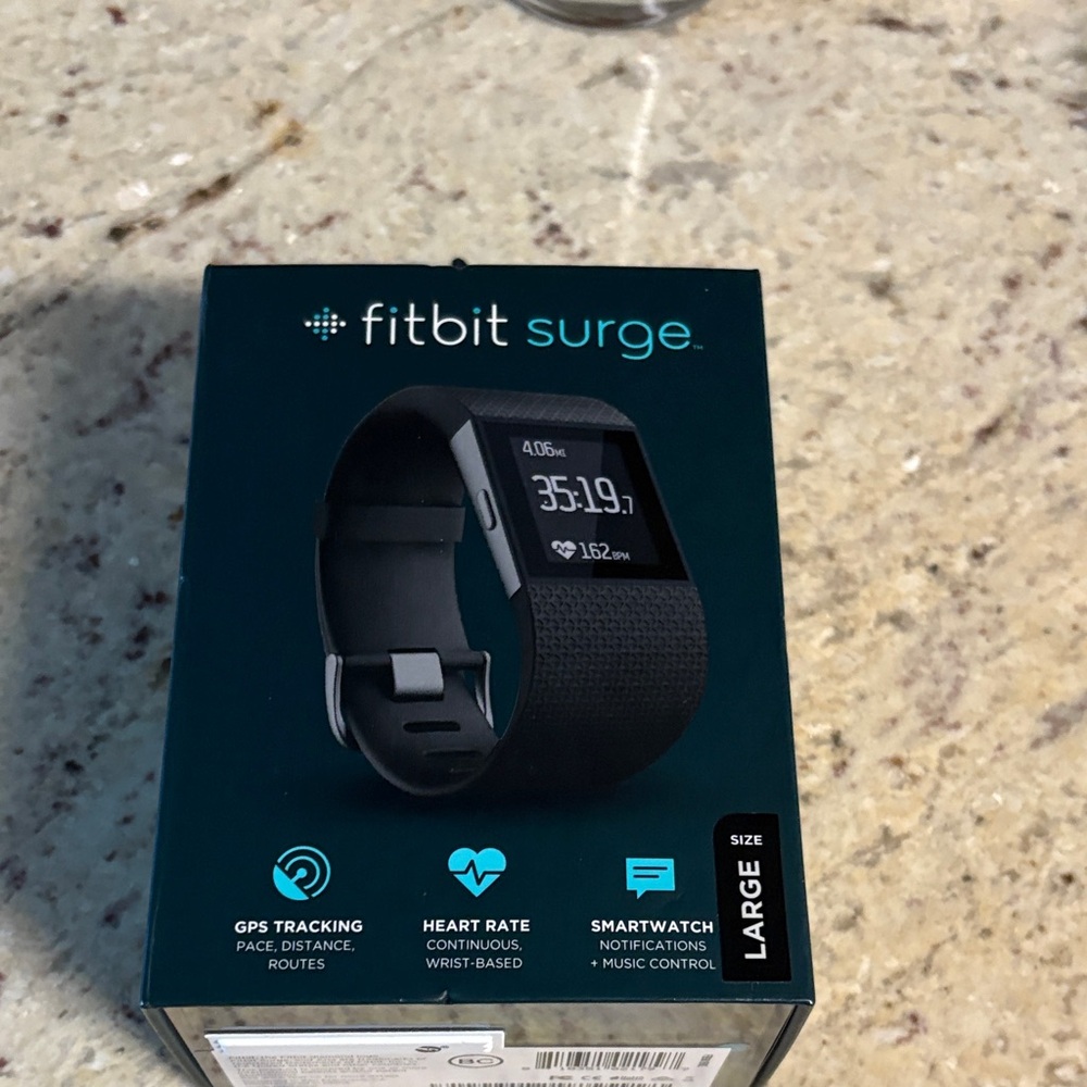This Fitbit surge is like new. It has tracking, heart rate and is a smartwatch.